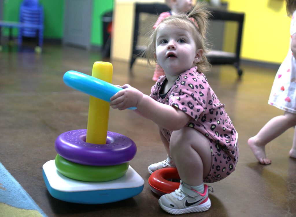 Child playing with toy